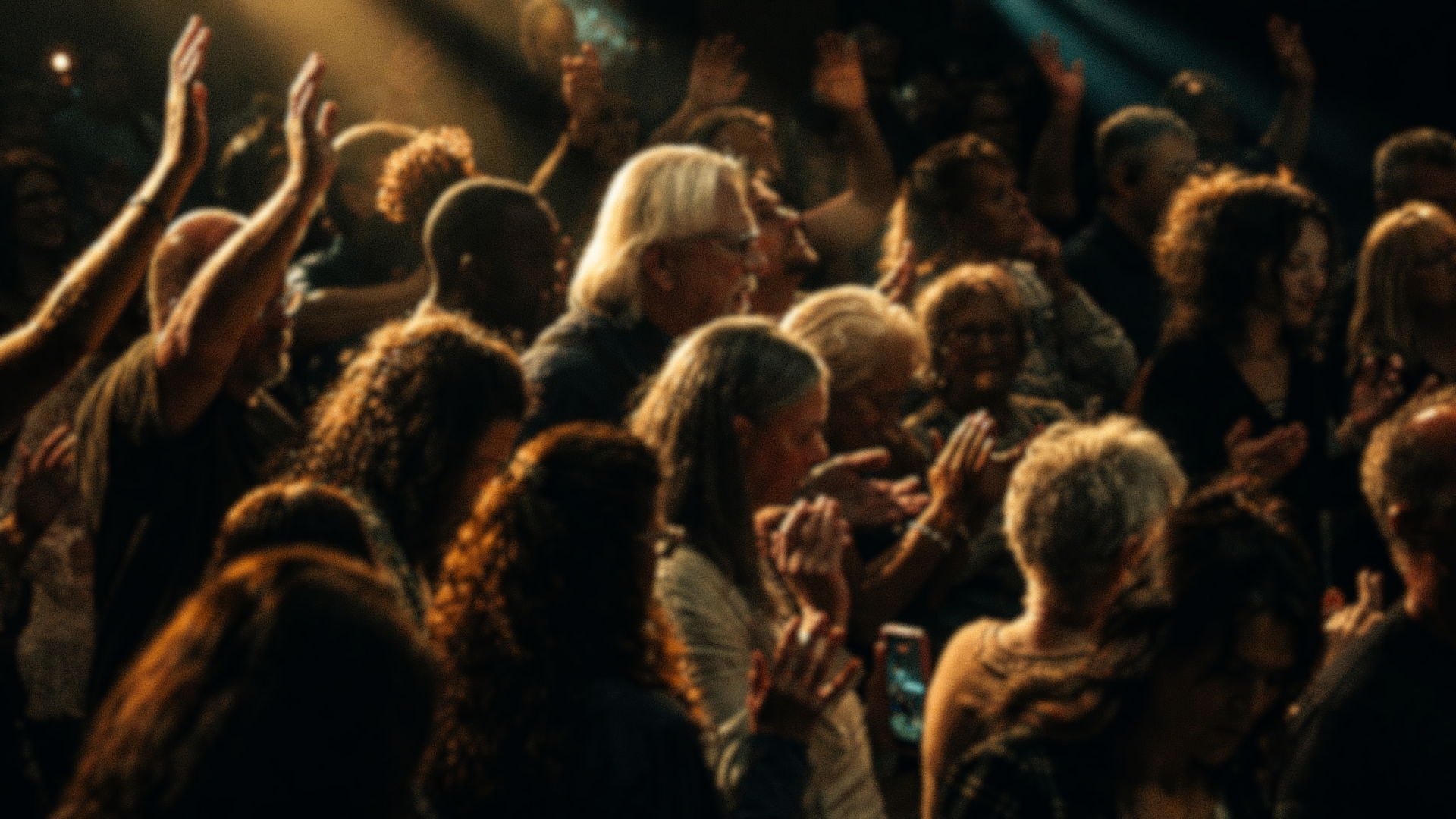 Crowd worshipping at a conference